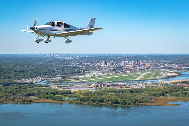 - General aviation airports: A small plane in the foreground over the Mississippi River departing from the St. Paul Downtown Airport.