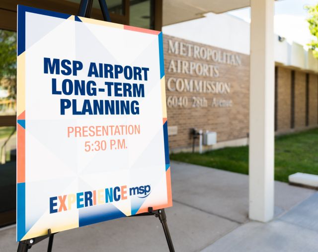 A sign announcing the Experience MSP event for the MSP Airport Long-Term Plan